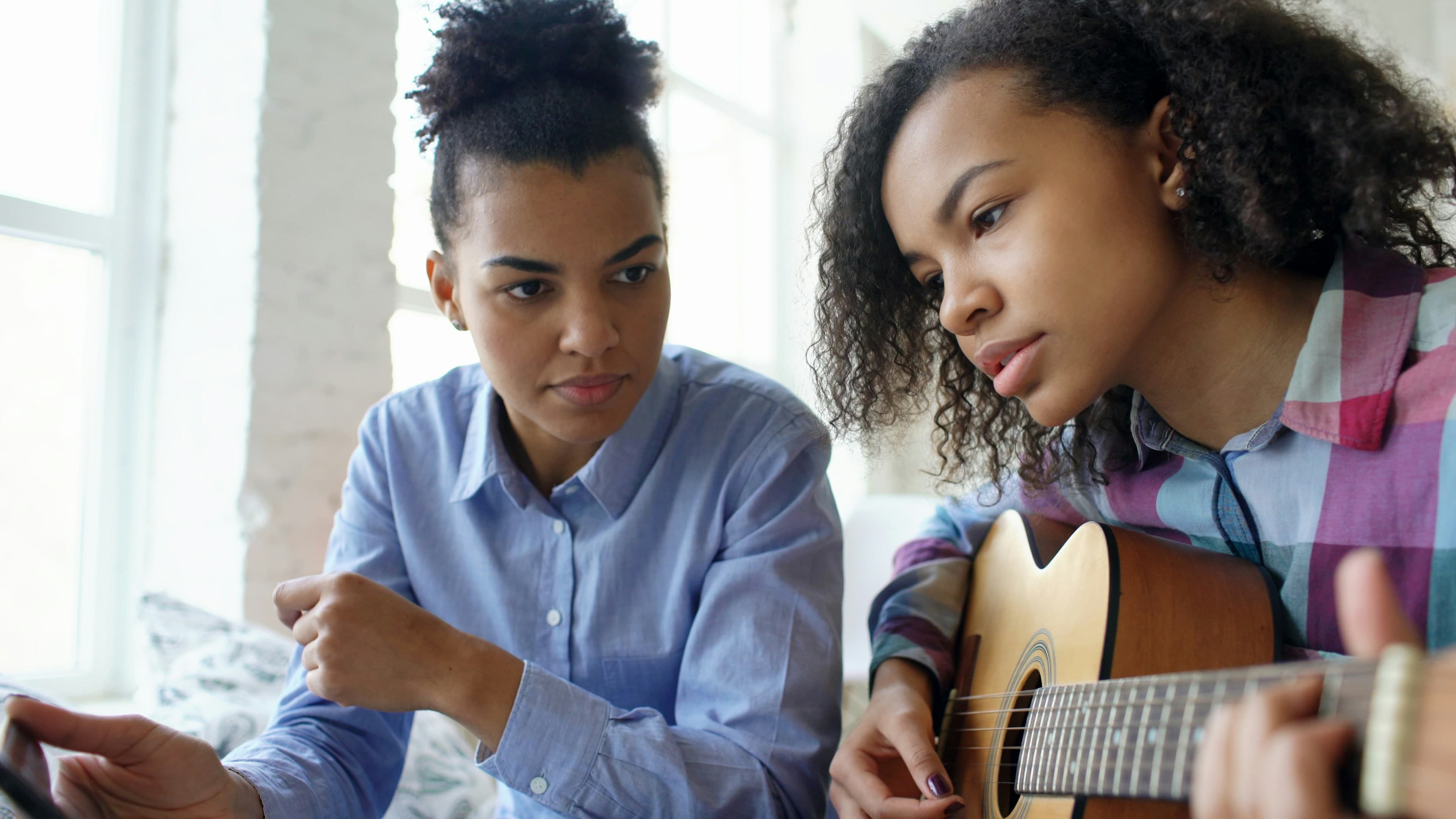 Music Lesson - Teacher with Student